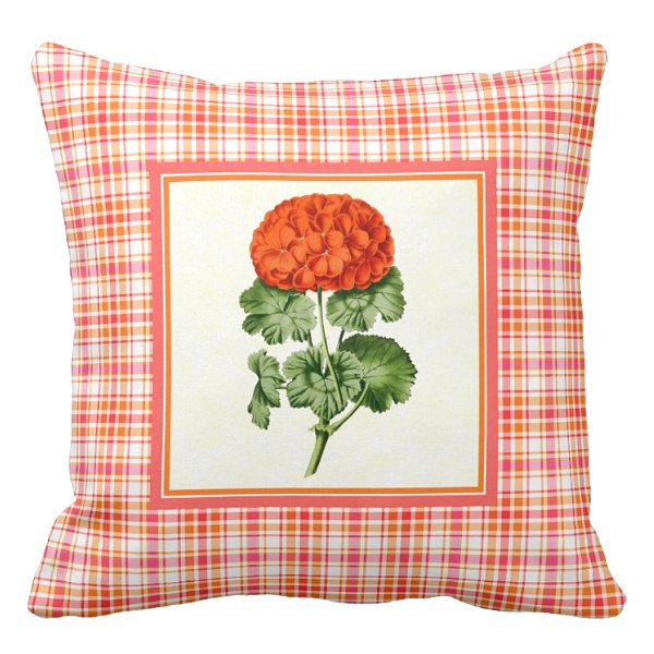 Orange geranium with hot pink and orange plaid pillow