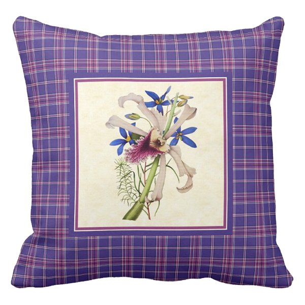Orchid with purple plaid pillow