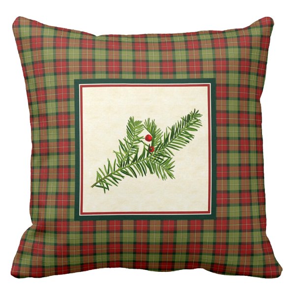 Yew berries with rustic Christmas plaid pillow