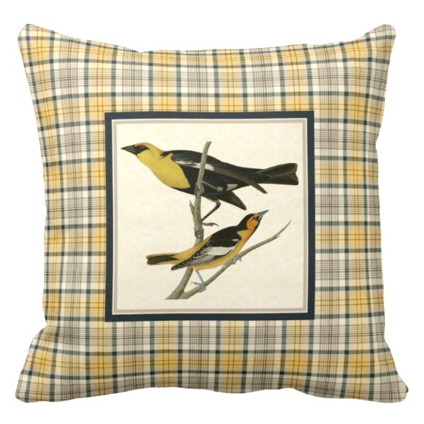 Blackbird with yellow plaid pillow