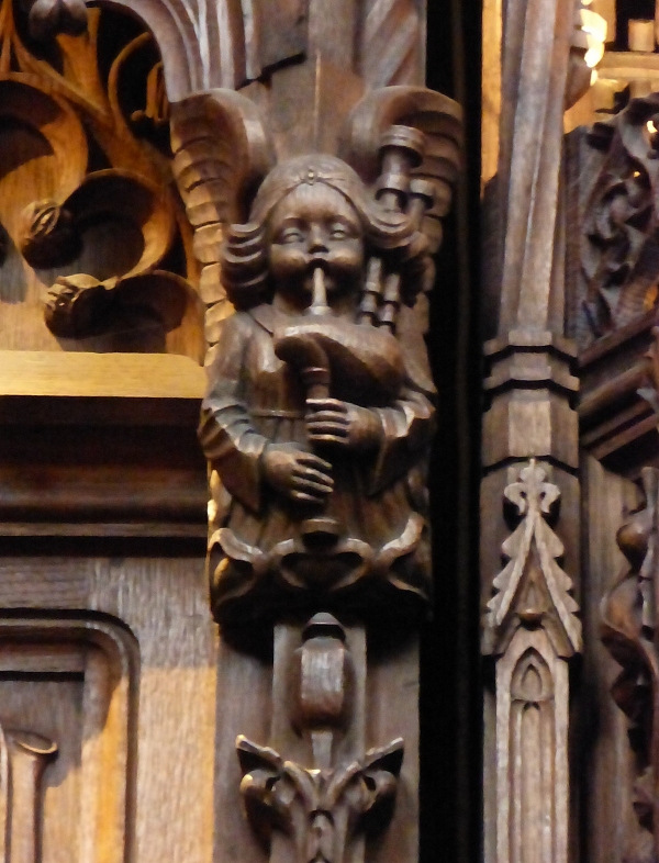 Angel playing bagpipes in the Thistle Chapel, St. Giles, Edinburgh by Kim Traynor